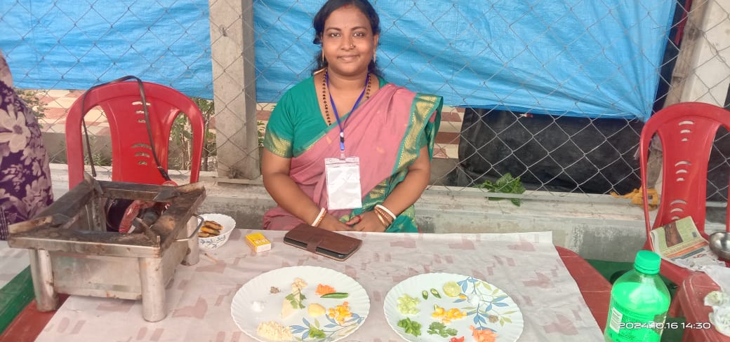 Women at cooking stations during competition